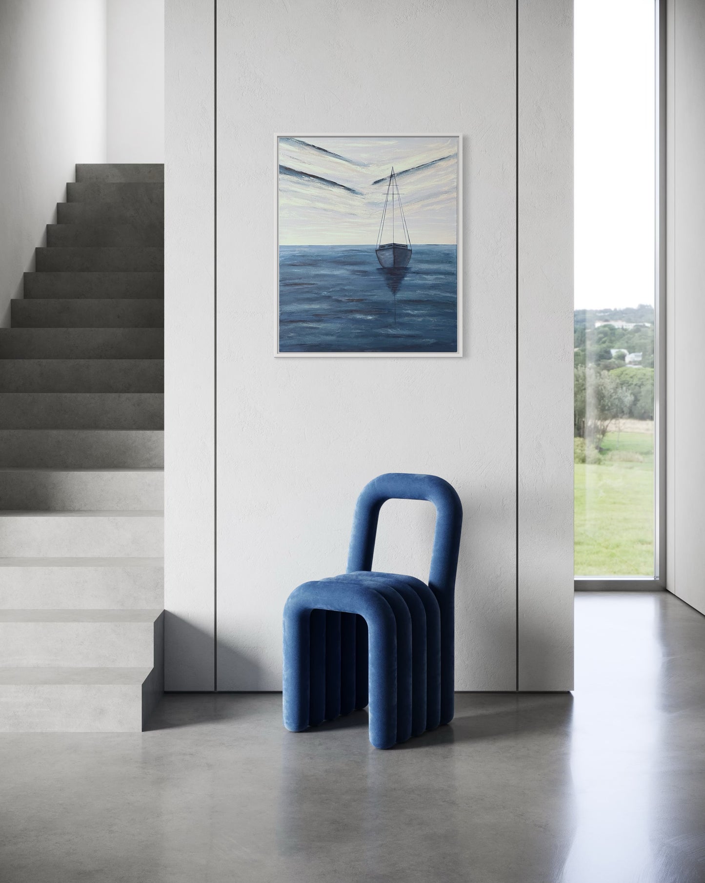 An affordable serene ocean painting of a solitary sailboat floating on calm, deep blue waters. The boat is slightly off center in the composition, with its reflection subtly visible on the water’s surface. The sky above is painted with soft, muted tones of pale blue, white and navy, with expressive brushstrokes forming abstract cloud patterns. The horizon line is faint, blending seamlessly with the sky and sea, creating a tranquil and minimalist atmosphere. The wall decor hangs on a white wall in entryway.