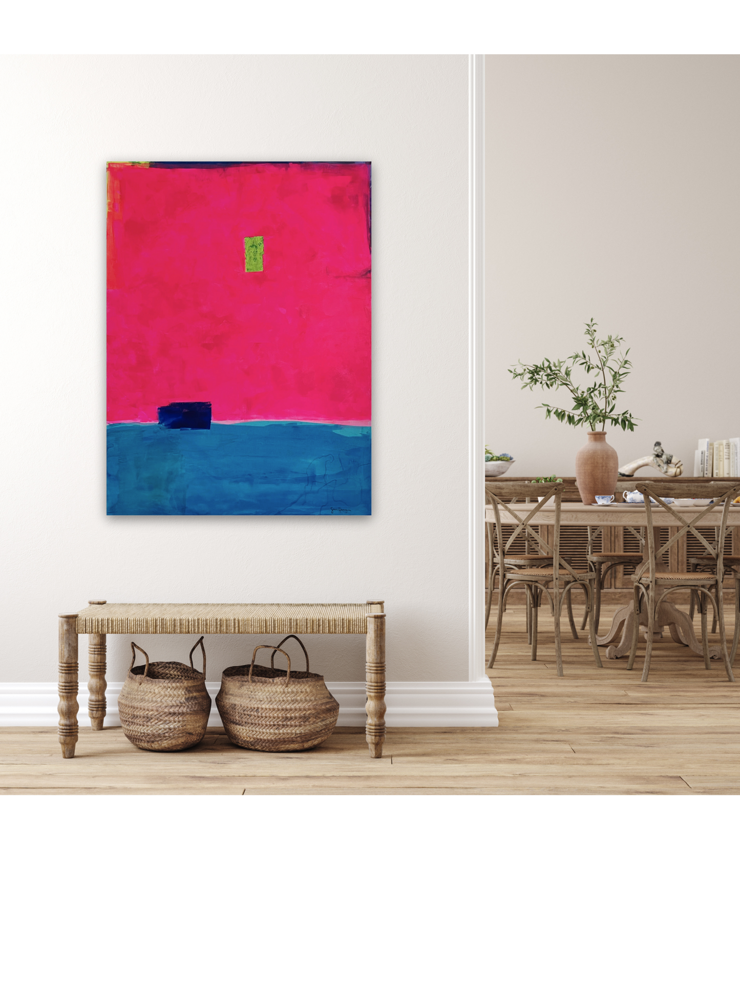 Oversized large abstract art features a bold composition of vibrant fuchsia pink occupying the upper portion and deep blue in the lower section. A small, ultramarine blue rectangular shape sits near the dividing line, while a tiny neon green rectangle is positioned slightly above the center. Along the top, the fluorescent pink stops short of the edge of the canvas, showing a small border of blue, purple, and neon yellow. The 36"x48" original painting hangs on a white wall in a Scandinavian living room.