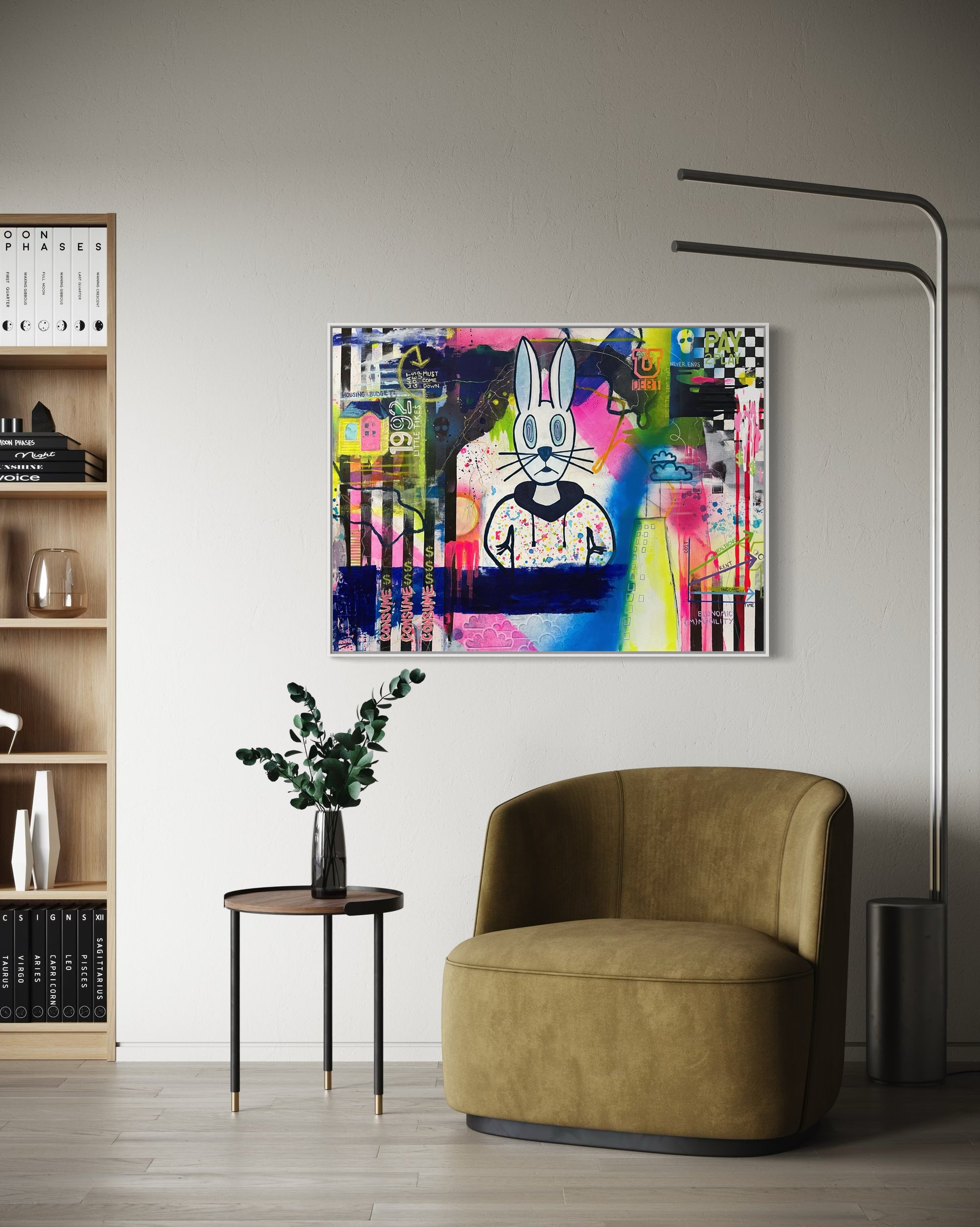 An original 30"x40" painting by Chicago Artist Sarah Henry in abstract expressionist style with graffiti and street art elements hangs on a white wall. The art showcases the struggle of economic mobility for the working, middle, and lower classes with visual commentary on the housing crises, student loan debt, global warming, economic volatility, increasing cost of living, and flat wage growth. It sits above an olive green club chair.