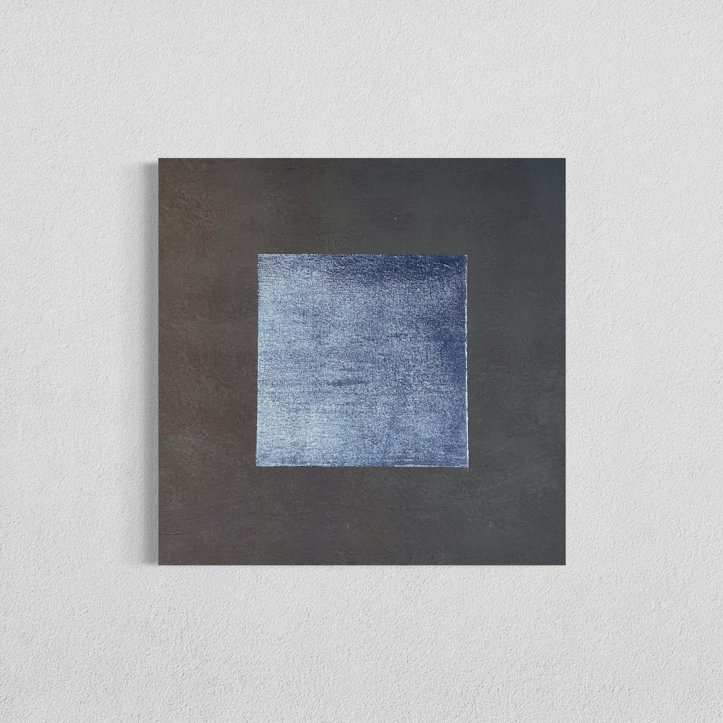 A painting with a textured Payne’s Gray square centered on a dark background in a minimalist abstract painting.