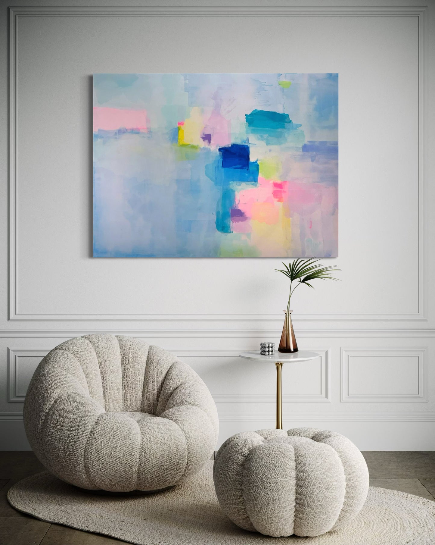 Large abstract art featuring ethereal soft pastel tones of pink, blue, teal, and yellow in a hall.