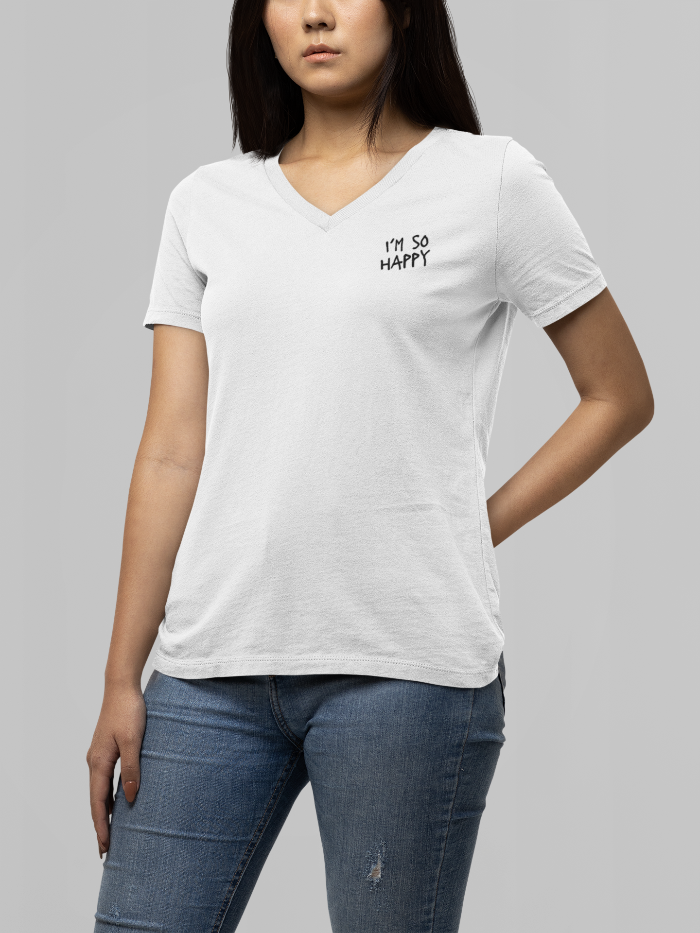 Unisex V-neck Nirvana shirt in white, featuring the phrase 'I'm So Happy' with a smiley face graphic and text on the front and back.