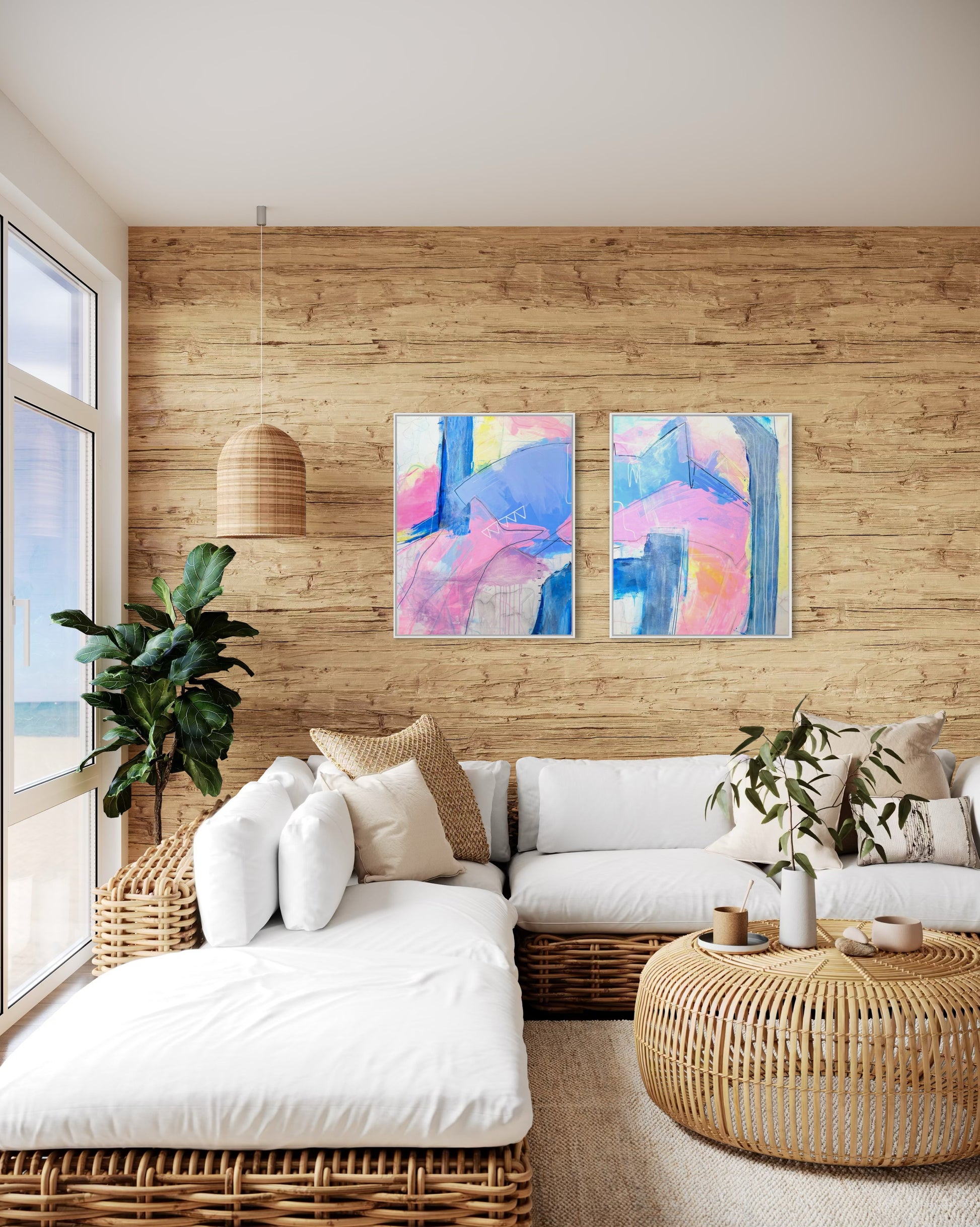 "Palm Beach " is a diptych of abstract paintings featuring soft, layered strokes in shades of pink, blue, and yellow. The compositions include geometric and organic shapes with subtle linear details, creating a harmonious and modern aesthetic. This affordable coastal grand millennial decor hangs in a palm beach style living room.