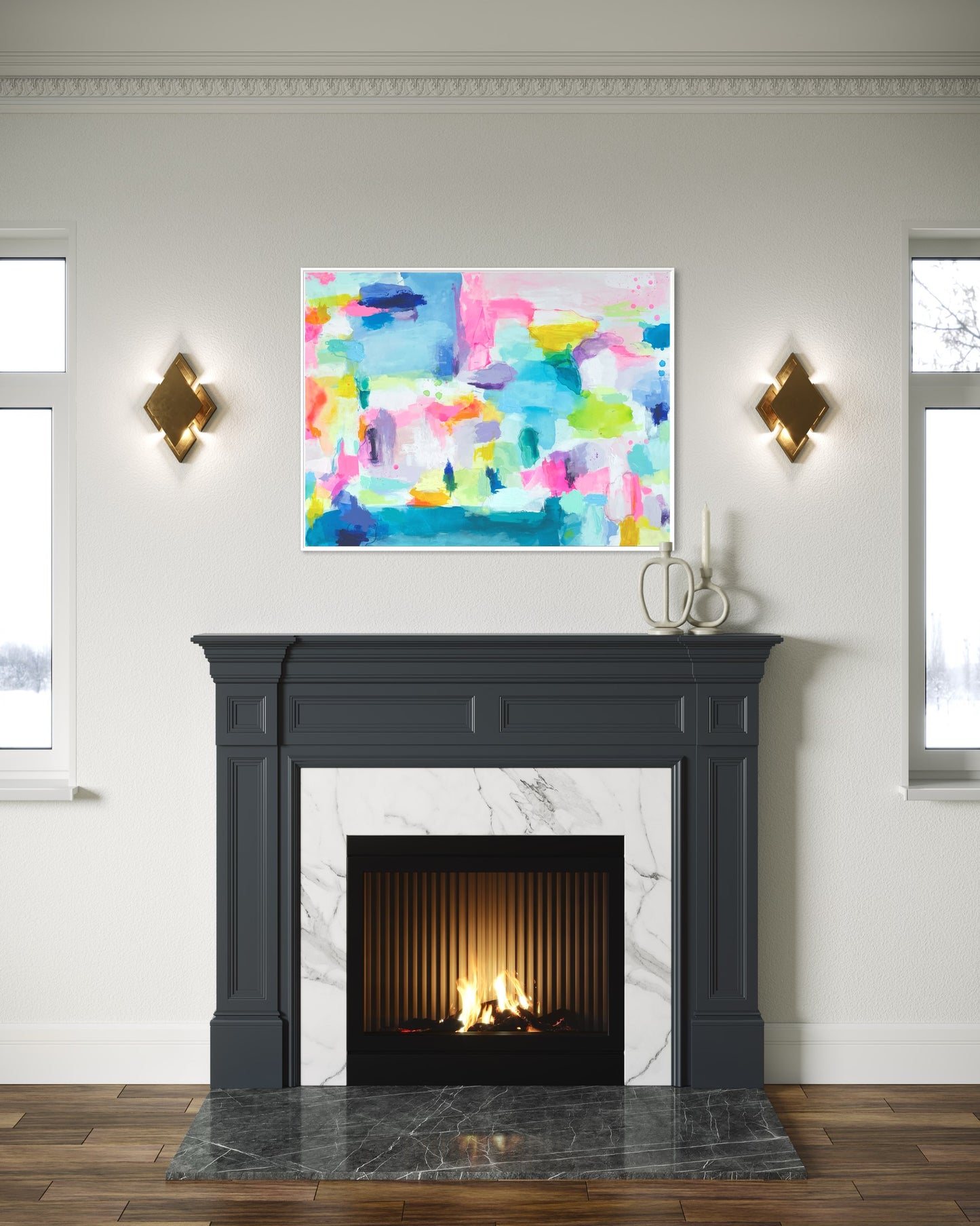 The Dolly Original Abstract Painting by Sarah Henry as part of the Happy Art Collection, shown on a gray wall with detailed crown molding hanging above a dark gray fireplace with white marble and two bronze light sconces.