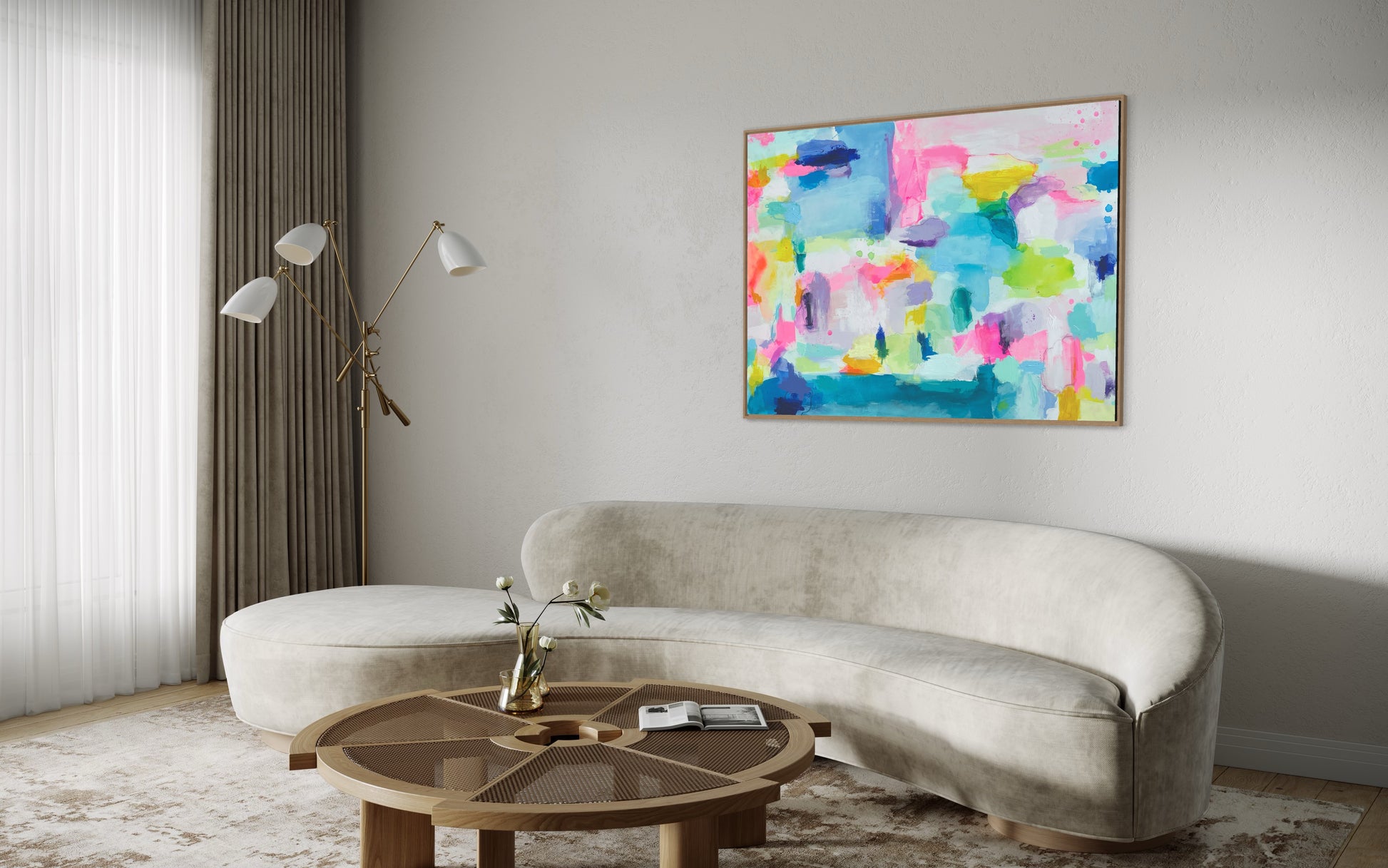 The Dolly Original Abstract Painting by Sarah Henry as part of the Happy Art Collection, shown on a light gray wall above a modern curved velvet sofa with a light wood round coffee table.