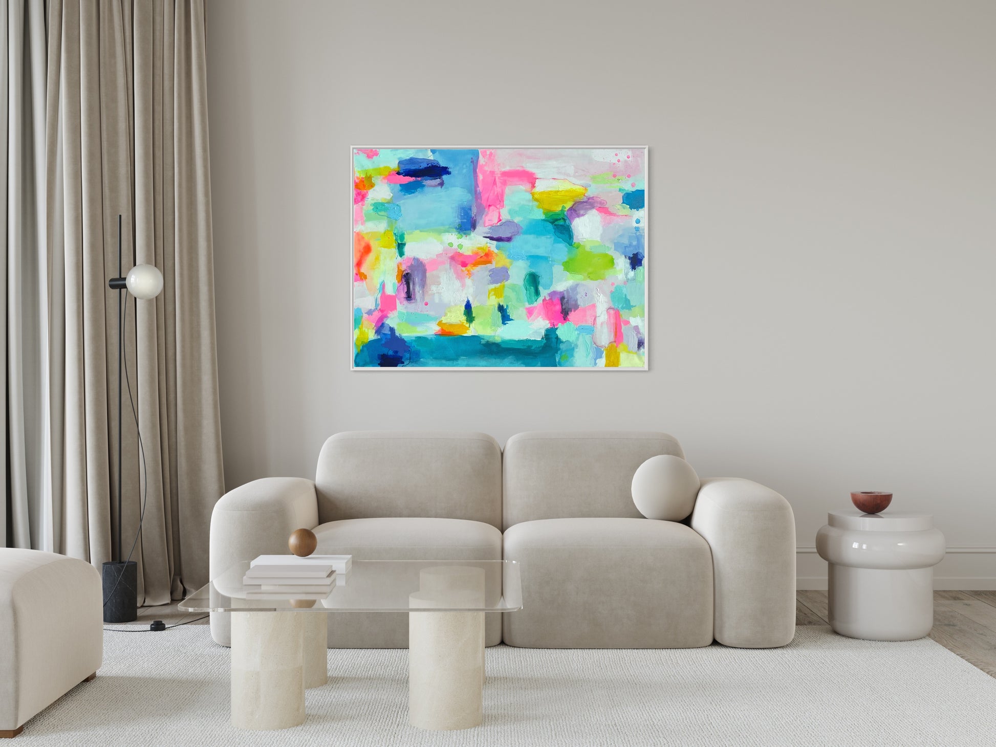 The Dolly Original Abstract Painting by Sarah Henry shown in a monochromatic white living room with a cloud white sofa, a concrete and glass coffee table, and a white acrylic side table.