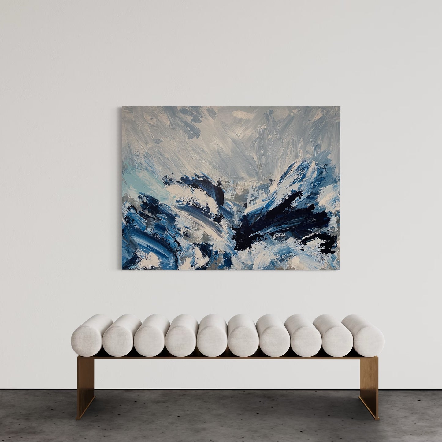 Abstract painting titled "Crashing Waves" featuring bold strokes in deep blue, white, and gray, representing the energy and motion of ocean waves against a stormy sky.