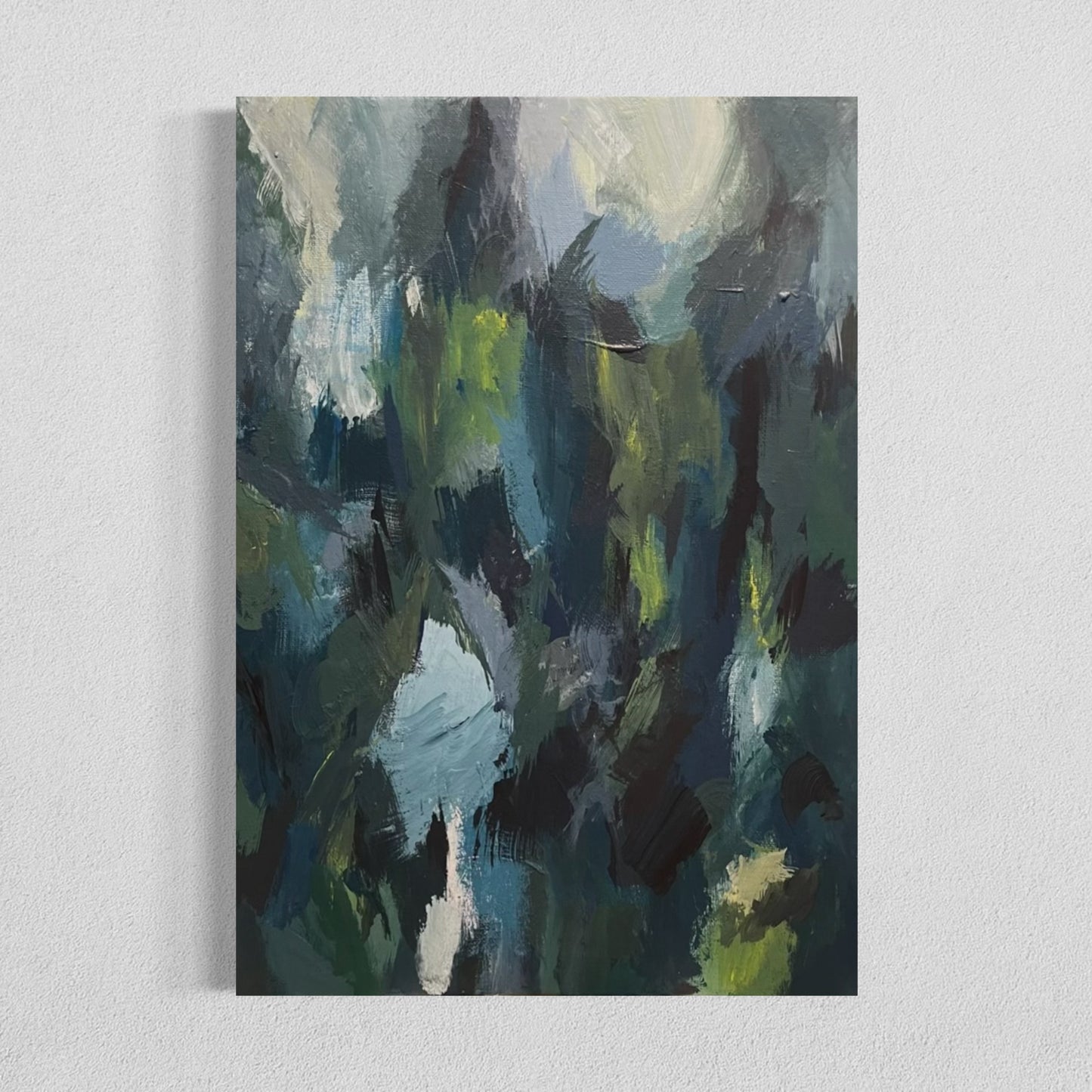 Abstract painting titled “Birds of a Feather” featuring layered brushstrokes in deep greens, dark blues, and light creams with expressive textures, evoking the feeling of a forest scene or hidden flock in nature.
