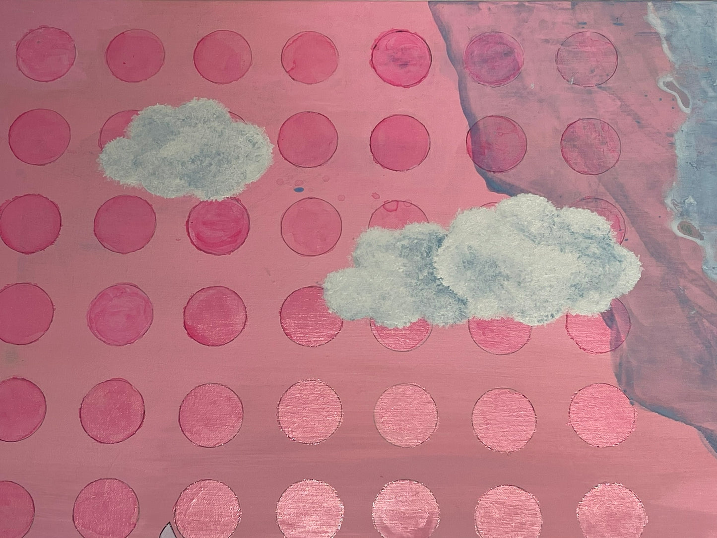 Hand painted pink polka dot pattern with two white cloud-like shapes on a textured pink background