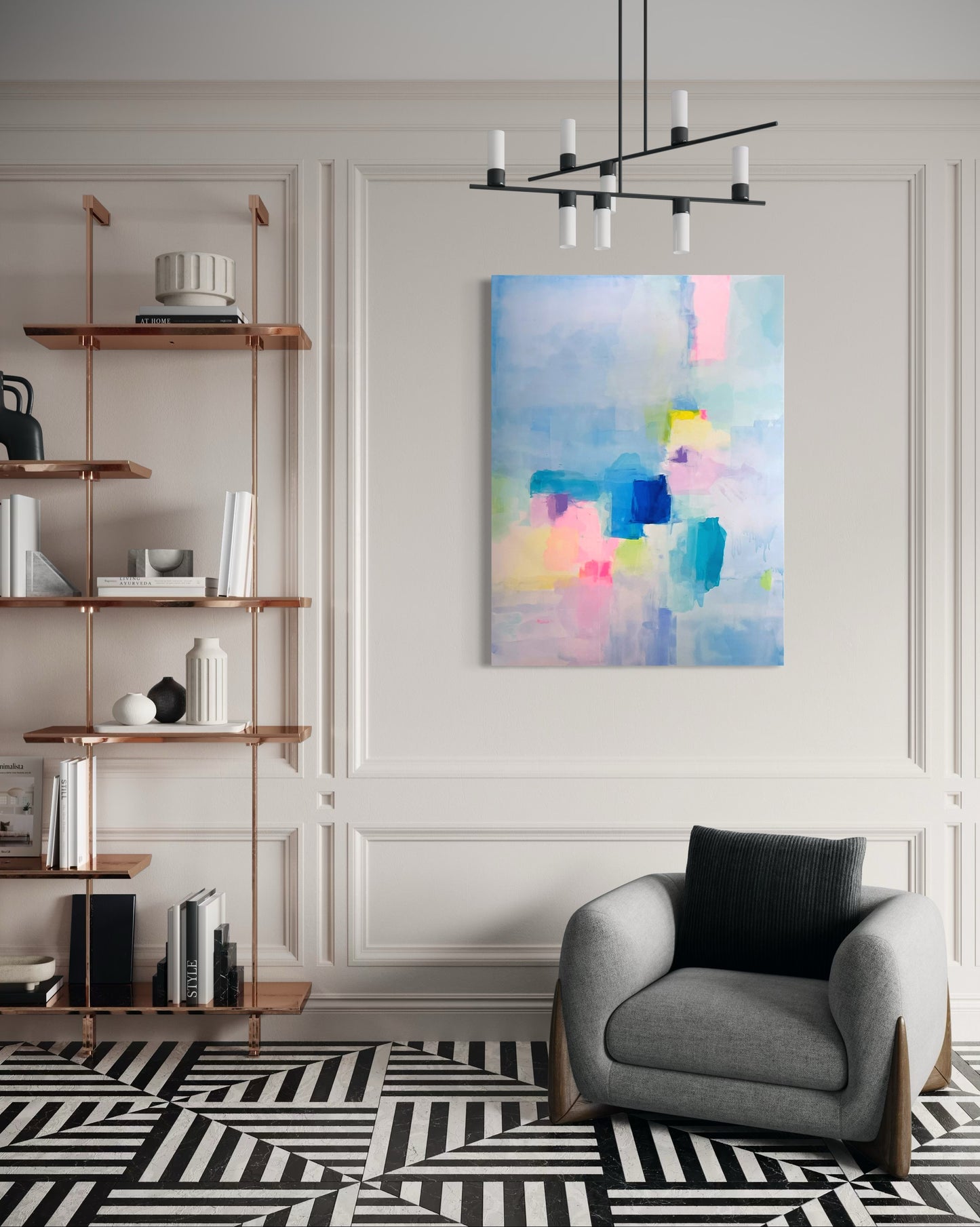 Modern living room with contemporary abstract painting, bookshelf, and armchair.