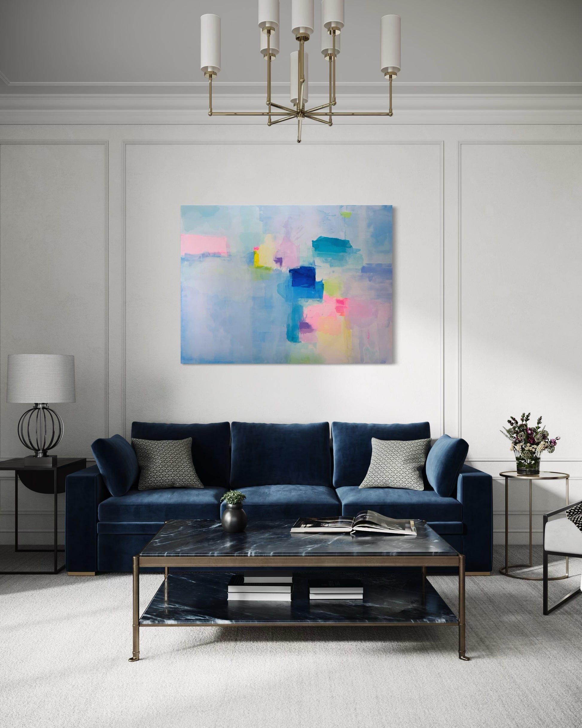 Modern living room with a blue sofa, preppy abstract painting, and decorative elements.