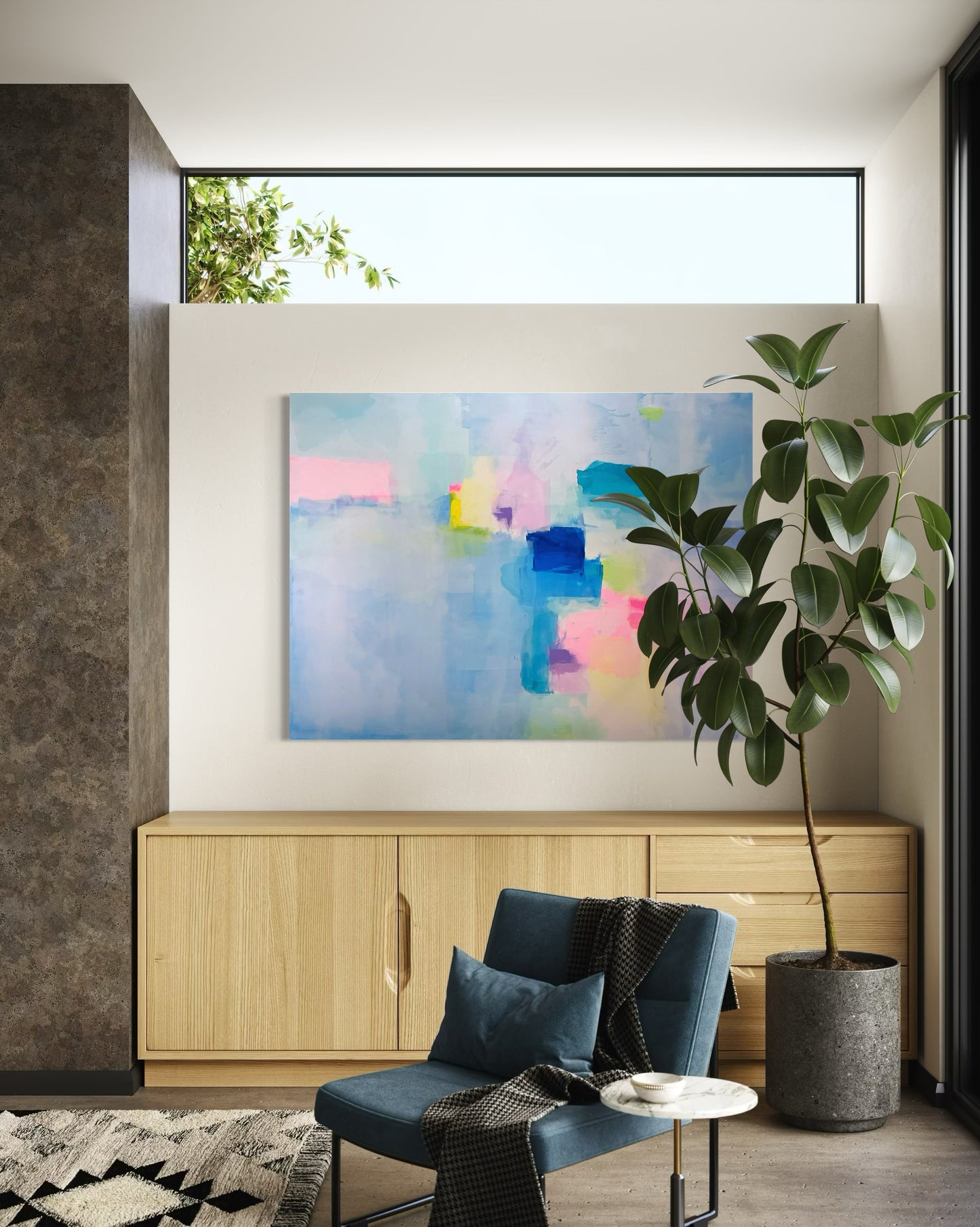Modern living room with abstract art, blue chair, and potted plant.