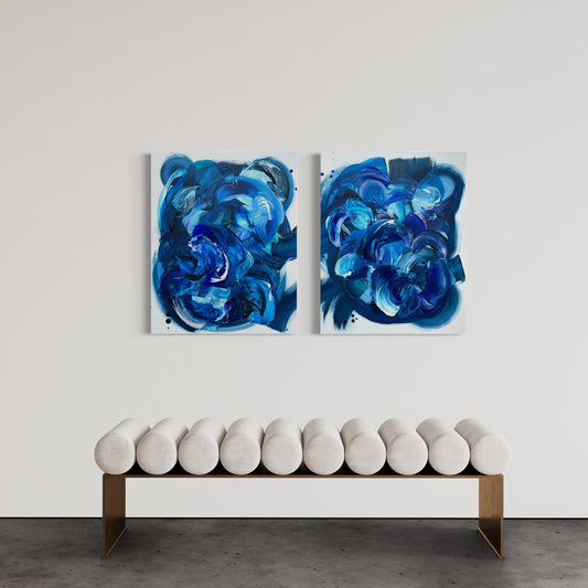 Abstract diptych painting titled "Chicago Blues" featuring swirling brushstrokes in various shades of deep blue on two adjacent white canvases, inspired by the rhythm and emotion of blues music.