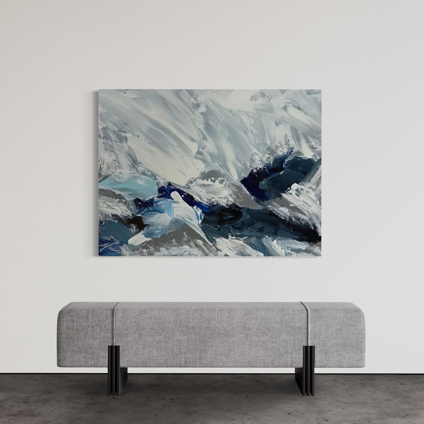 Abstract painting titled Crushed Ice featuring bold, swirling strokes in icy white, slate gray, and deep blue tones, evoking the texture and motion of shattered ice or a snowstorm.