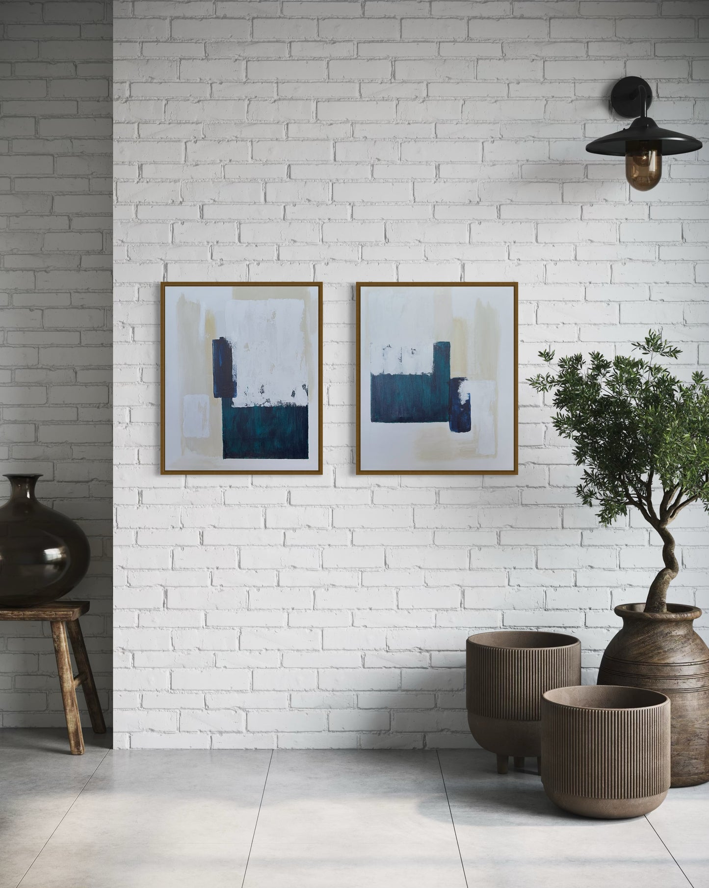 Two framed white beige turquoise paintings on a white brick wall with nordic vases and plants.